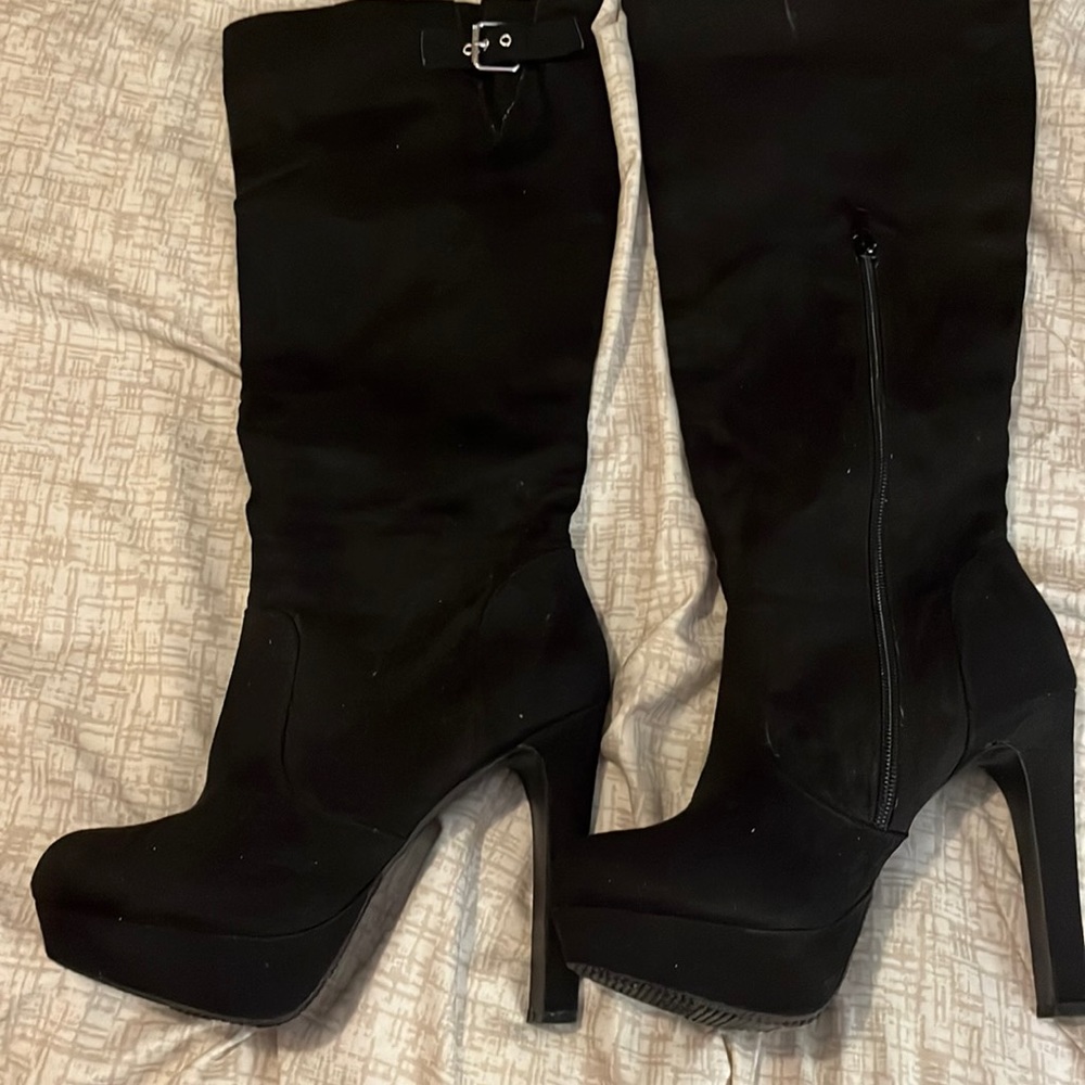 Like new black knee high heeled boots